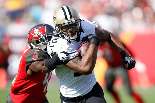 Marques Colston of the New Orleans Saints runs with the ball as