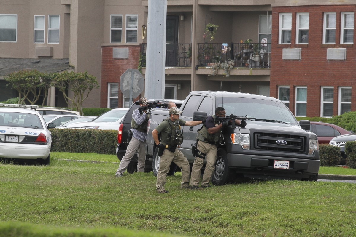Triple shooting suspect surrenders with infant in arms | wwltv.com